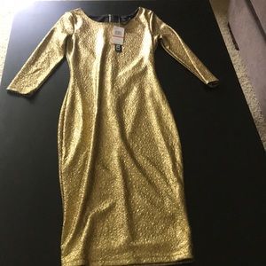 Gold dress NEVER BEEN WORN. Tags attached